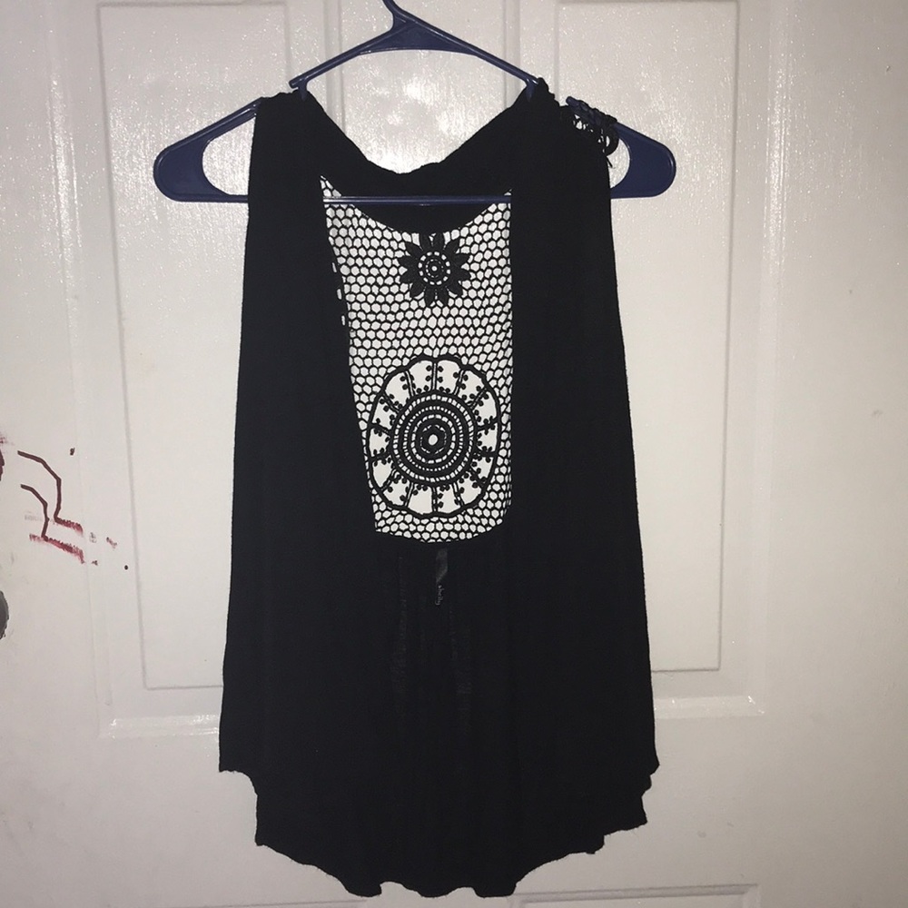 A Shirt It’s black with design on the back